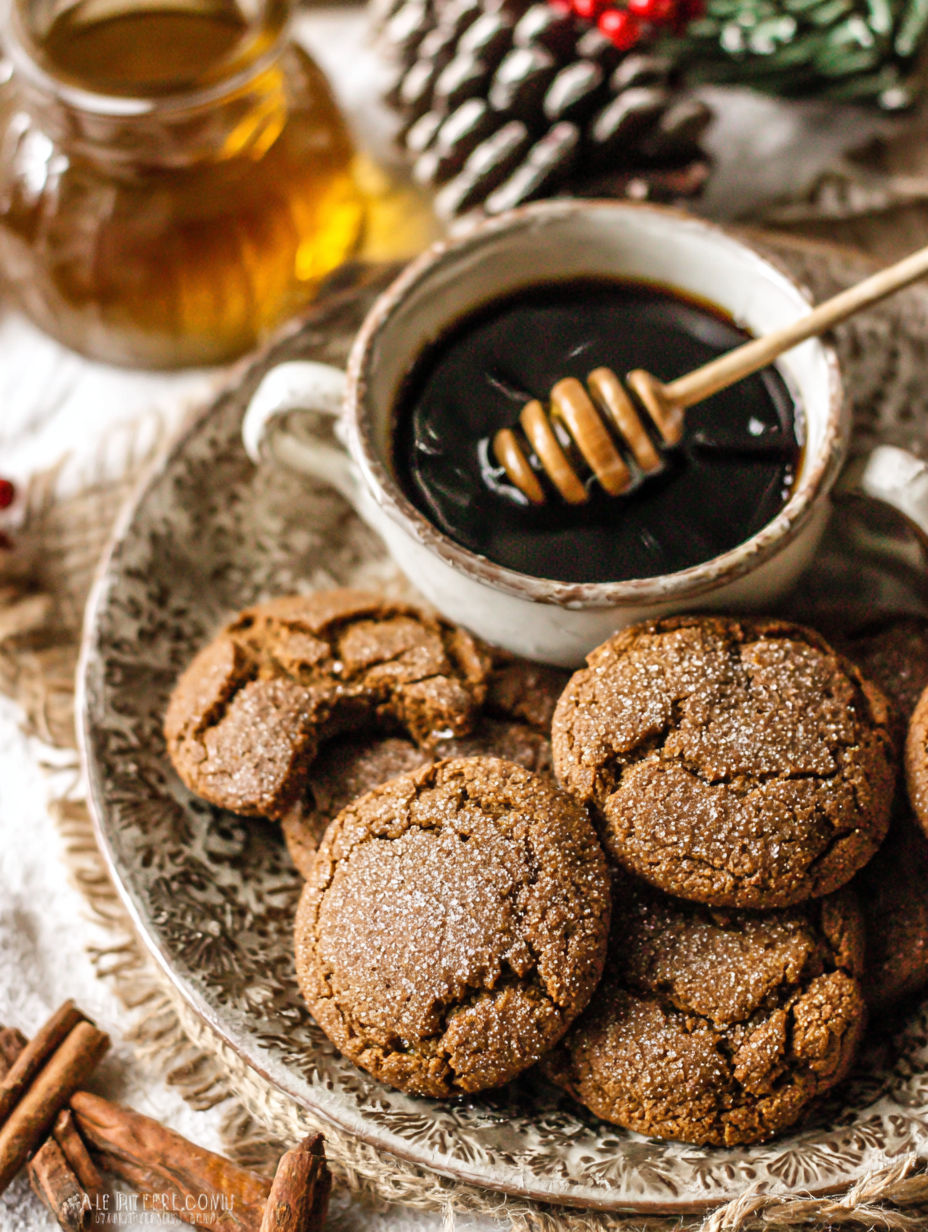 A plate of cookies with a honey drizzle.