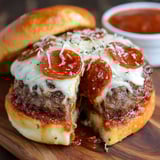 A slice of pizza burger with cheese and pepperoni.