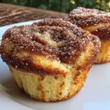 Two cinnamon sugar french toast on a plate.