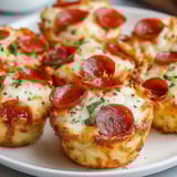 A plate of pepperoni muffin cupcakes.