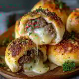 A plate of savory stuffed cheese bombs.