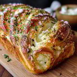 A swirled garlic herb cheese bread.