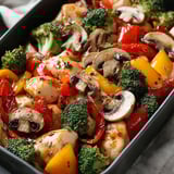 A dish of chicken and vegetables.