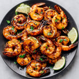 A plate of grilled Cajun shrimp.