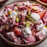 A bowl of strawberry snowflake crisps.