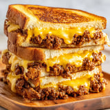 A sandwich with meat and cheese.