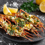 A plate of garlic butter and lemon shrimp.