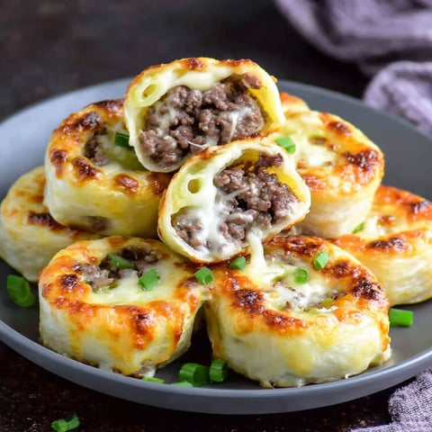 A plate of keto Philly cheesesteak rolls.