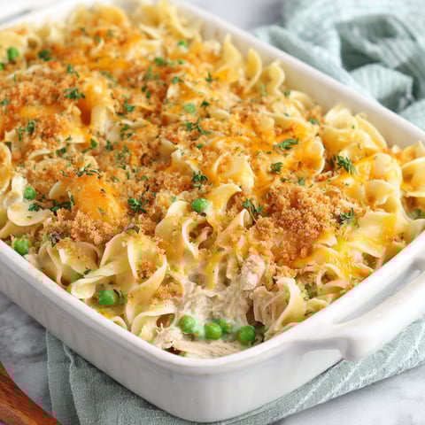 A white bowl filled with a tuna noodle casserole.